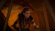 Aloy heading into the ruin.