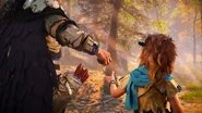 Rost giving Aloy a Medicine Pouch.