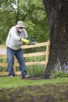 Man wearing  and spraying 
