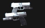 Una variante de la pistola Heckler & Koch USP reglamentaria del U.C.A.B..