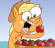 Applejack begins eating apples like crazy.