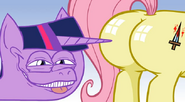 Twilight Sparkle's about to poke Fluttershy's butt.