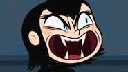 Mavis snarls at Klaus during their Vamp Off.