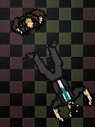 Phantom's apparent dead body after being shoved by Manny Pardo.