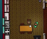 Rosa sitting at the dining room table.