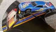 Prototype found in the 1992 Mattel Catalog. Blue car was suppose to be a T-Bird Stocker (1990). Same car appears on the actual packaging