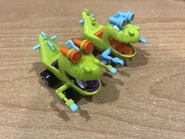 Comparison between the 1998 and 2021 renditions of the Reptar Wagon