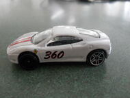 This is a Ferrari 360 Modena from the 2010 Ferrari 5 Pack with the incorrect back wheels.