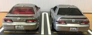 A back view of the 2020 Hot Wheels ’98 Honda Prelude silver (left) and 2021 metalflake silver (car culture, modern classics, right).