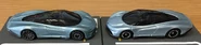 A side view of the metalflake light blue Hot Wheels McLaren Speedtail (left) and the gray-blue Tomica McLaren Speedtail (right, 1/68)