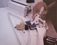 RadiatorSpringsTrackSet.jpeg (154 KB) Part of Radiator Springs track set featuring Guido and a Pontiac Grand Prix Stocker