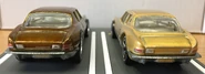 A back view of the 2011 Hot Wheels Studebaker Avanti: Super Trea$ure Hunt$ (left) and Regular Treasure Hunt (right)