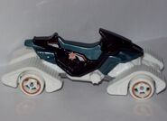 aqua seat, orange-white-red tampo on side, orange-chrom rims on wheels