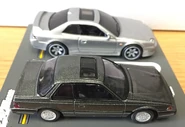 A side view of the 2021 Hot Wheels ’98 Honda Prelude metalflake silver (car culture, modern classics, top) and 2017 Tomica Limited Vintage NEO ’85 Honda Prelude 2.0 Si (1/64, bottom).