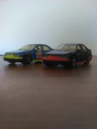 1991 First Editions versions, black global mainline version (Right) and Canada Exclusive rally deco version (left)
