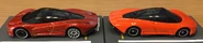 A side view of the metalflake orange Hot Wheels McLaren Speedtail (left) and the orange Tomica McLaren Speedtail (right, 1/68)