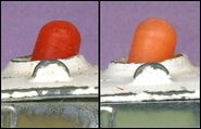 Variations in color of plastic used on FE; Red plastic on left, Orange plastic on right