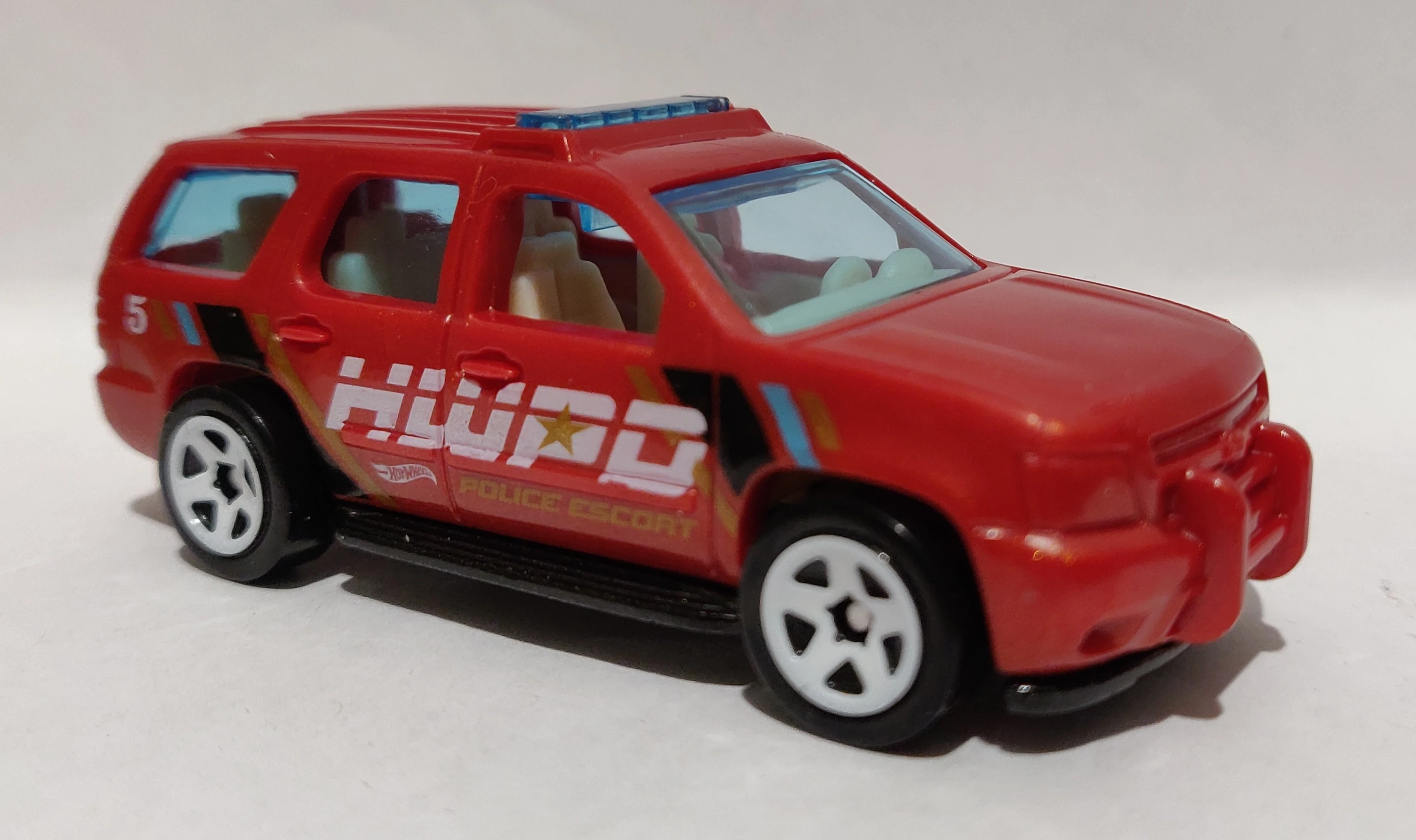 Hot wheels chevy 2024 tahoe police