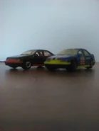 Australiancarlover's own 1991 First Editions Peugeot 405 Canada exclusive (left) and mainline (right) Versions
