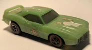 Body underneath the chrome is green. This car has seen better days.