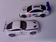 BMW Z4 M paired with a BMW M3 GT2 (both 2012 versions)