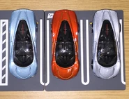 A top view of the Hot Wheels McLaren Speedtail from left to right: metalflake light blue, metalflake orange, metalflake gray