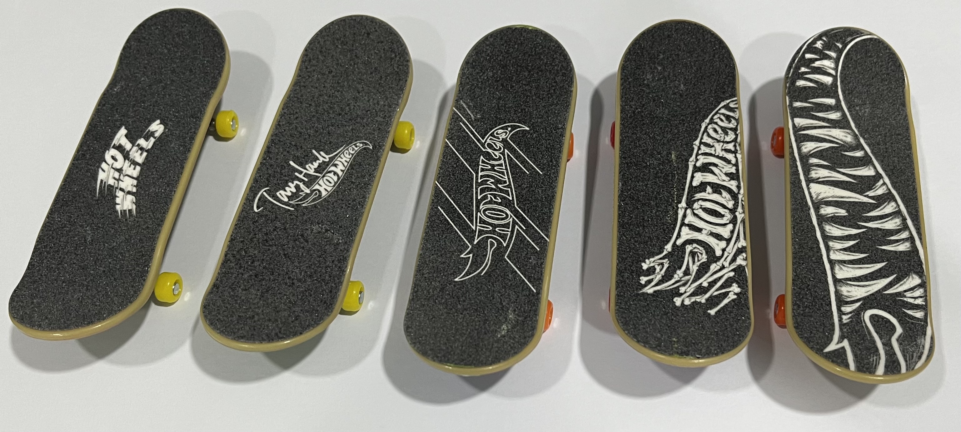 Hot Wheels Skate Neon Bones Tony Hawk Set of 4 Fingerboards and 2 Pairs of  Skate Shoes 