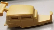Resin model featuring a large spoiler on the rear.