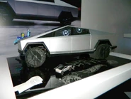 Display from the 2020 NY Toy Fair recreating the Cyberturck's announcement, only Elon Musk has been replace with Skeletor. (T-Hunted)