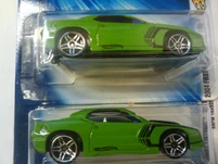 The tampo on top is offset so much, it cuts into wheel well. The vehicle below also has tampo offset, but not as extreme.