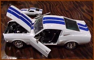 For the Legends: Multi-Scale 2-Car Sets. Note the Big Scale is in White, but the actual production car came out in Blue. (markscoolestwheels.com)