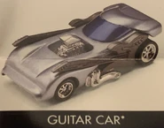Resin prototype with different design shown on a poster with the name "Guitar Car"