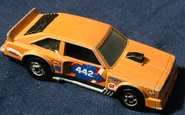 Orange version of the Flat Out 442 with blue pentagon tampo.