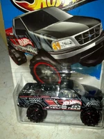 The rear red cover/hood in this 2013 Ford F150 is missing.