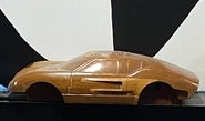 Wood GT40 4x Mold.jpg (22 KB) Wooden model for the Mattel's "Switch n Go" GT car (Bruce Pascal collection)