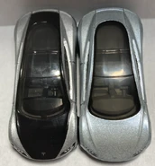 Hot Wheels (L) Matchbox (R) identical Tesla Roadster window toolings