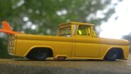 Custom '62 Chevy (yellow glass/surf board bed) from Pariah Customs