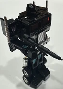 NemesisPrimeBlaster.jpg (443 KB) Nemesis Prime with blaster