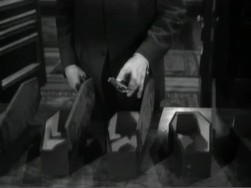 Placing The Colt Model 1903 Pocket Hammer back in the "miniature coffin."