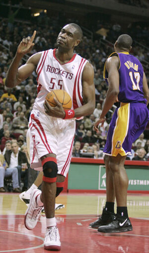 mutombo blocking a shot