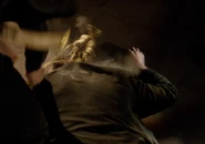 Andrew swinging at Bernard