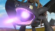 Toothless firing a plasma blast.