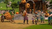 A villager juggling pumpkins