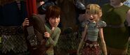 Astrid and Hiccup having seen Toothless coming to Hiccup