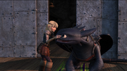 Astrid pets Toothless