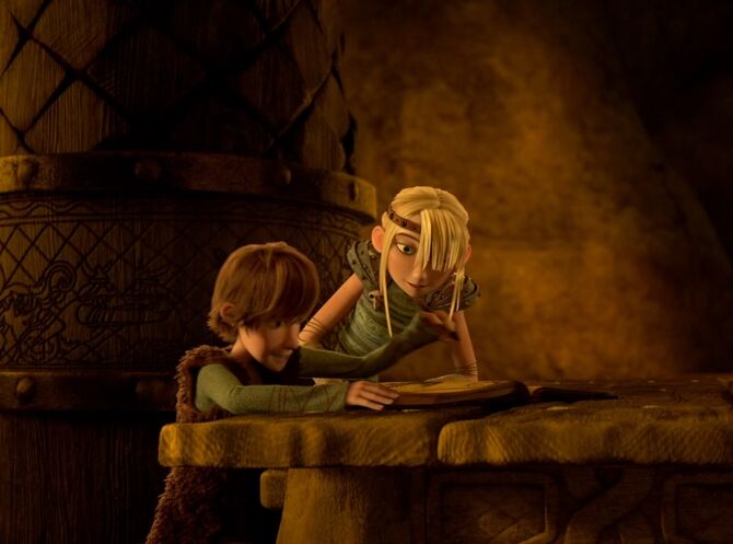 Astrid and Hiccup adding things to the books of dragons