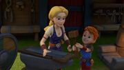 HA - Dak giving Hannahr the mallet.jpg