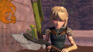 Astrid holding the axe