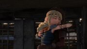 Astrid and Hiccup hugging.jpg
