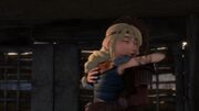 Astrid and Hiccup hugging